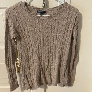 Tan knit sweater with zipper accents